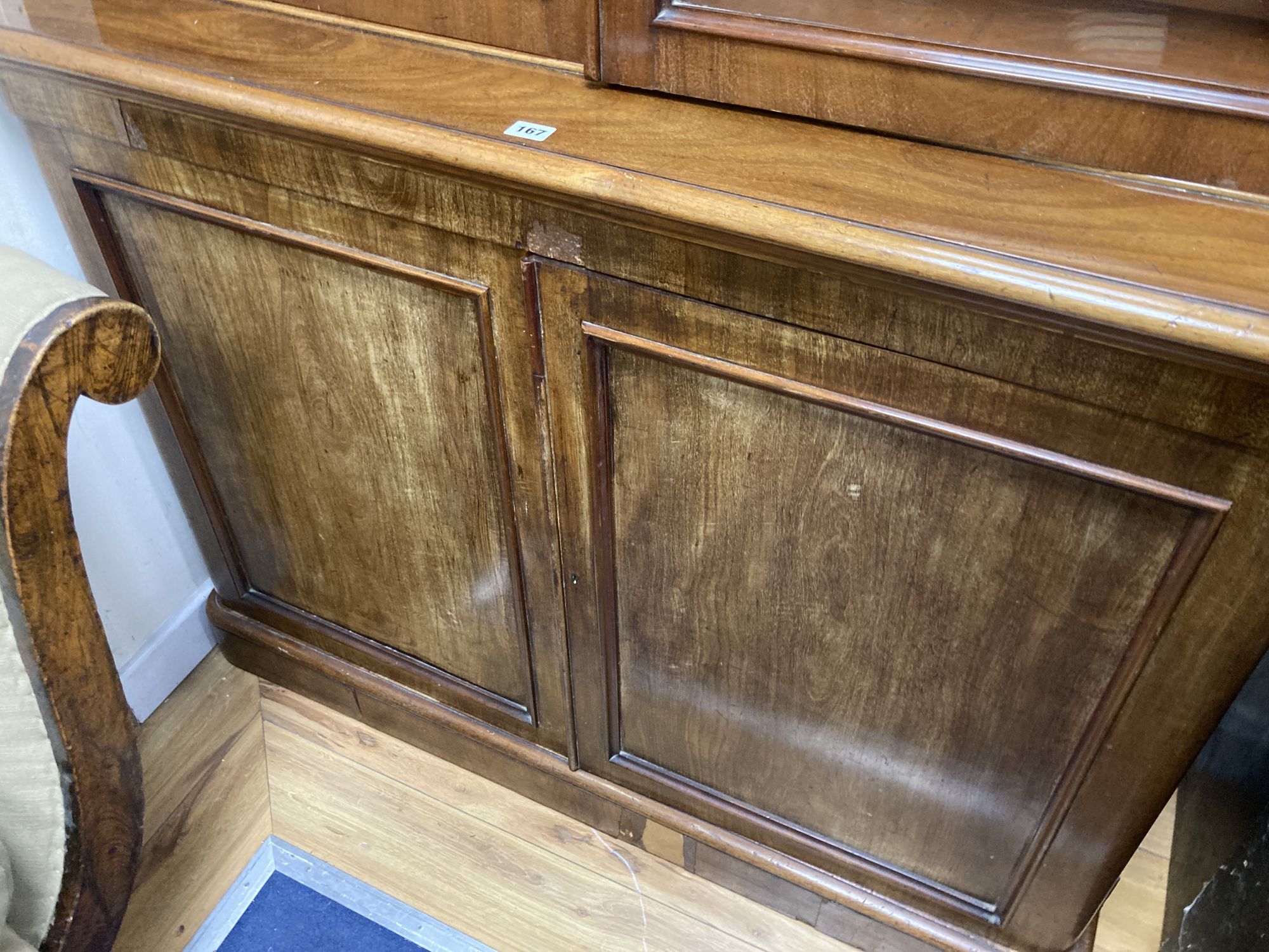 A Victorian mahogany glazed bookcase, width 122cm, depth 43cm, height 225cm